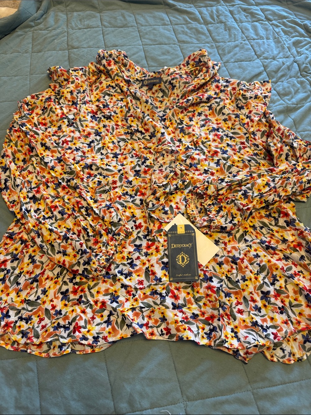 Democracy Floral Ruffle-Neck Blouse in White with Yellow, Red & Blue Flowers